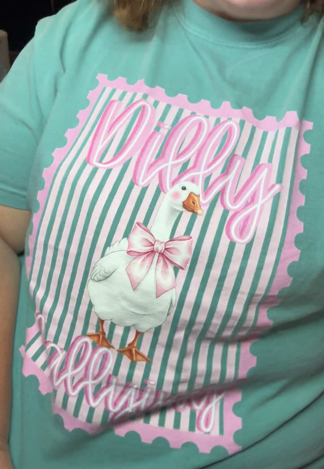 TikTok post by @jenniferreneenorton for PoppyRose Print Company. Caption reads: [...] time! But my shirt sure is cute!....