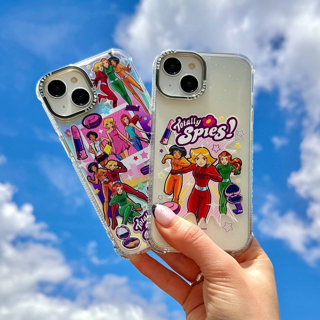 Instagram post by @totallyspiesofficial for Skinnydip London. Caption reads: New Mission Alert! 💖 The OG girl bosses have....