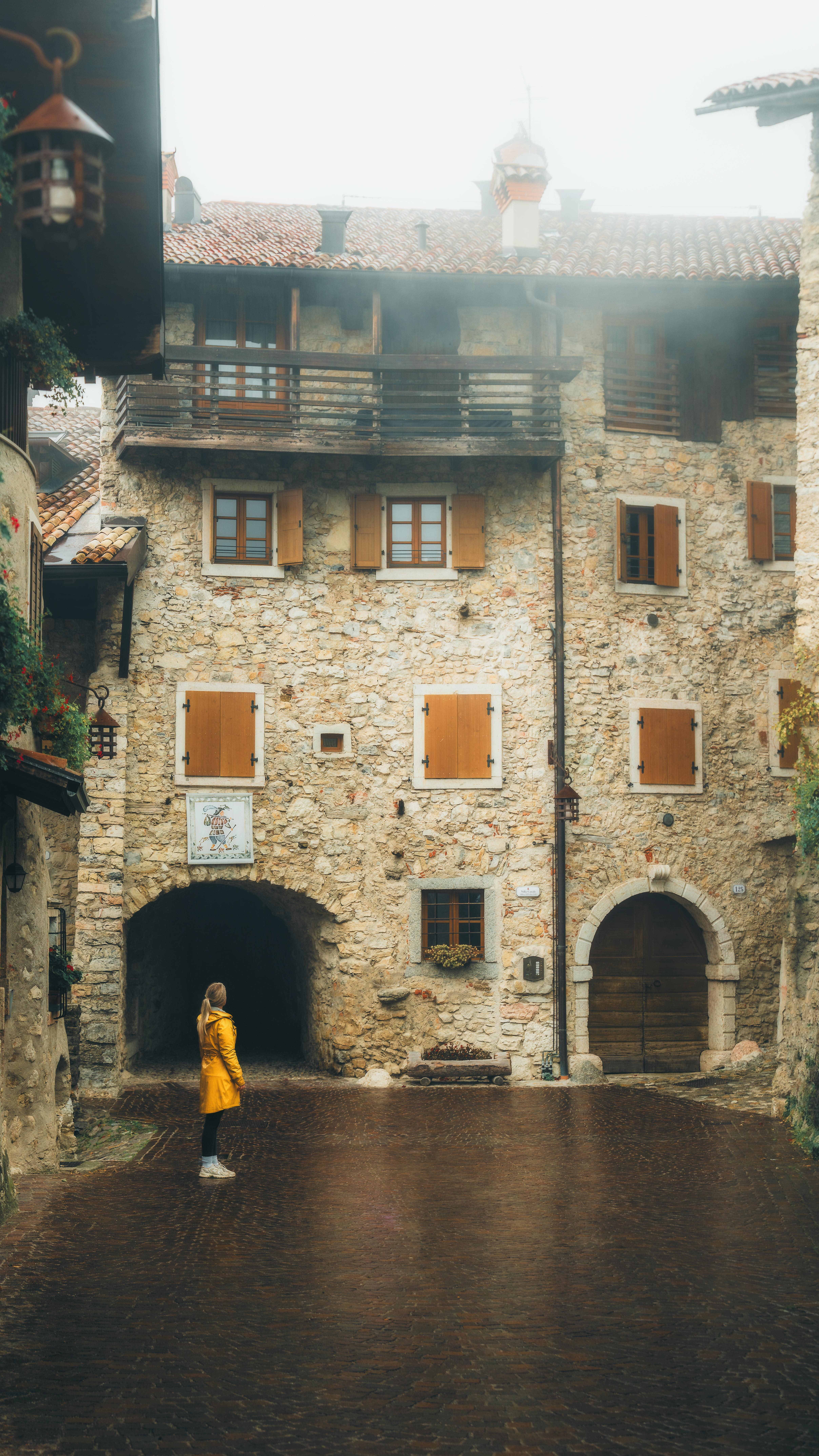 Instagram post by @giuliogroebert for Visit Trentino. Caption reads: [...] medieval village up in the hills of....