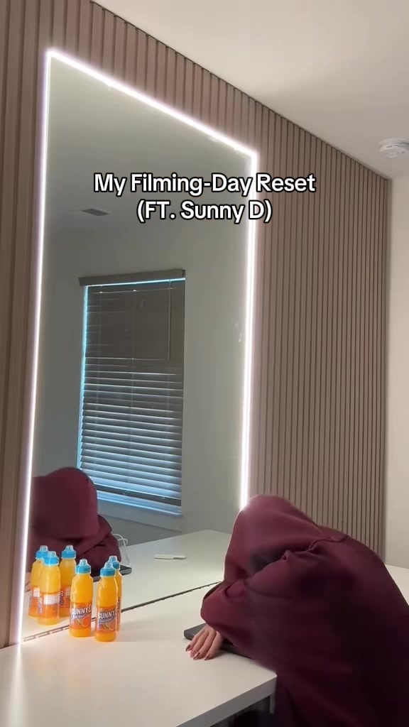 TikTok post by an influencer for SUNNYD. Caption reads: Filming reset day FT. @SUNNYD #ad #boldcore.