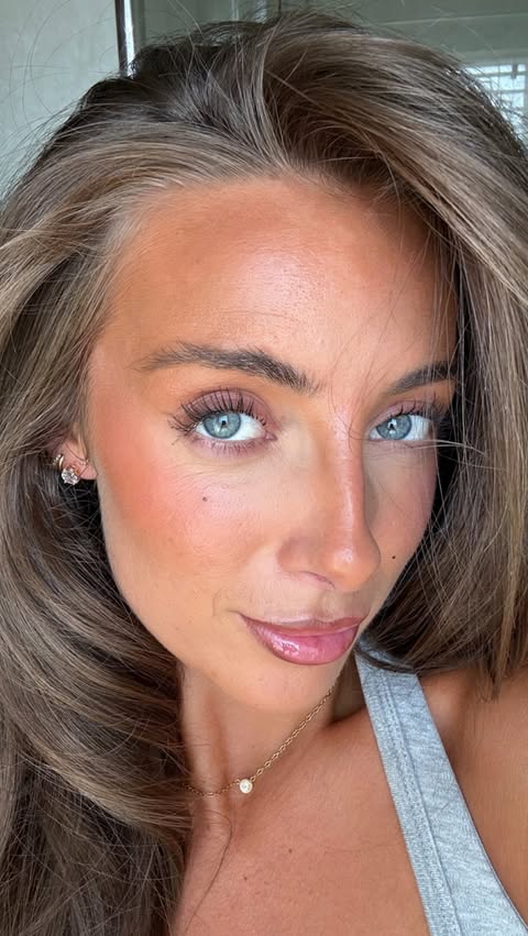 Instagram post by @carlyacton_ for LUMENE. Caption reads: products that layer like 🧈 @lumene Glow Boost....