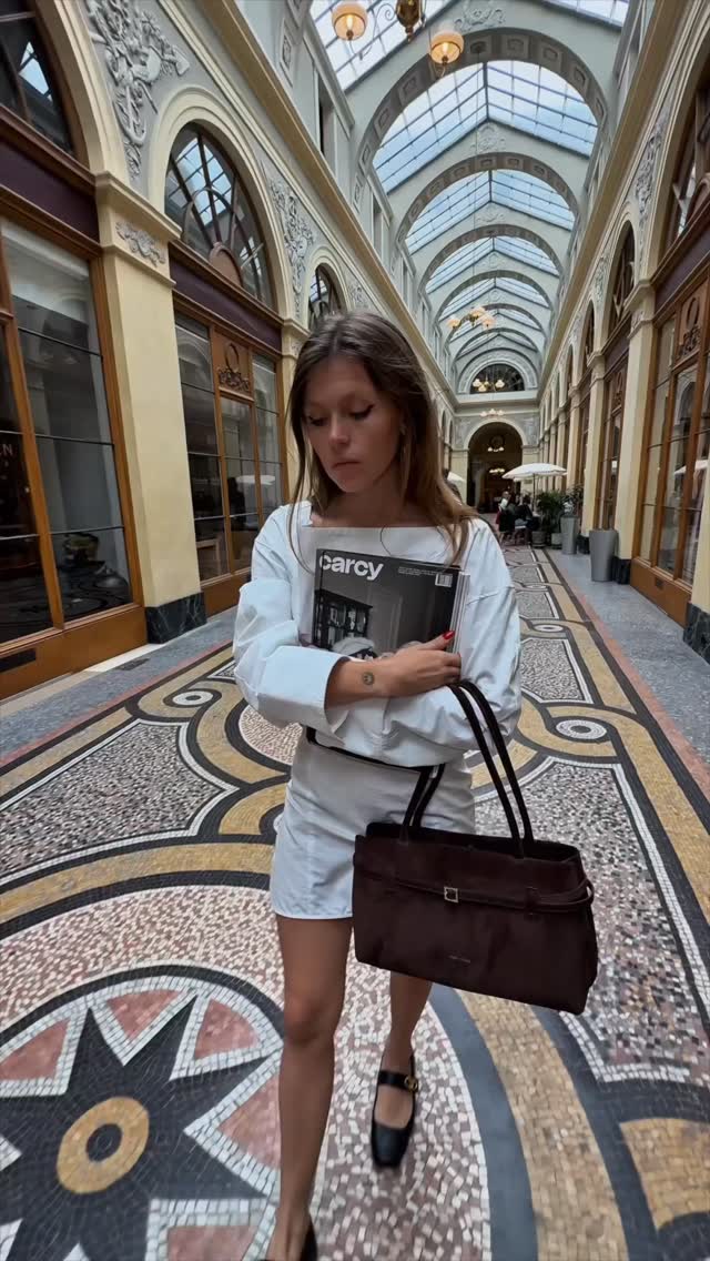 Instagram post by @stolzes for Manu Atelier. Caption reads: FINALLY SOMEONE ASKED ME WHATS IN MY BAG....