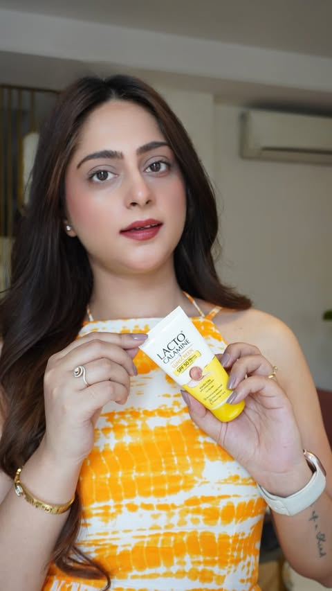 Instagram post by @glow_with_ojas for Lacto Calamine. Caption reads: [...] pick for everyday sun protection is Lacto....