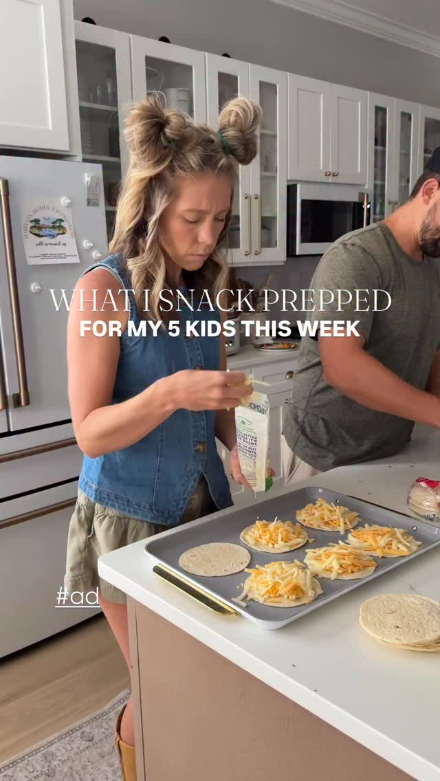 Instagram post by @stephleighworthy for Newman's Own. Caption reads: #ad Snack prep for 5 hungry boys? Say less. Making....