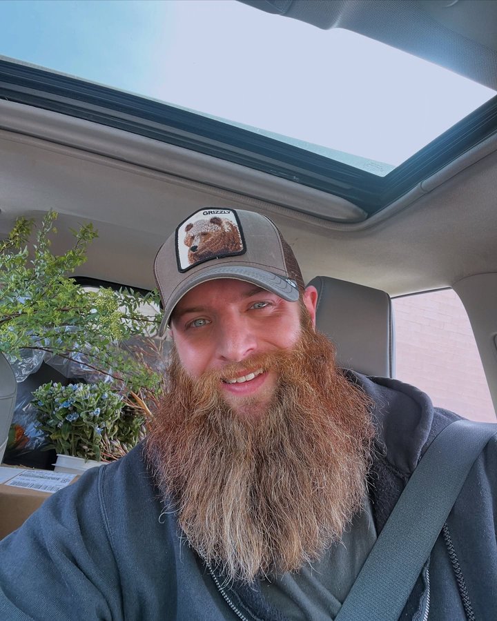 Instagram post by @thebeardedguywithflowers for Goorin Bros.. Caption reads: Happy almost Valentine’s Day! To all my floral....