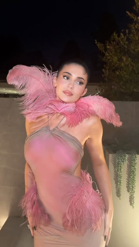 Instagram post by @kyliejenner for Kylie Cosmetics. Caption reads: @kyliecosmetics holiday party 💞💞💞🫦.