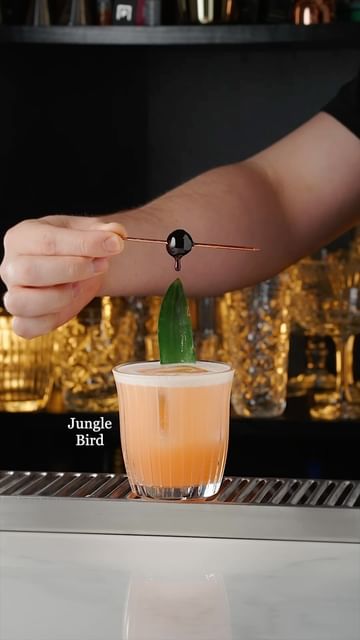 Instagram post by @ed_tales for Pasabahce. Caption reads: Jungle Bird 

Ad/21+

A delicious cocktail was....