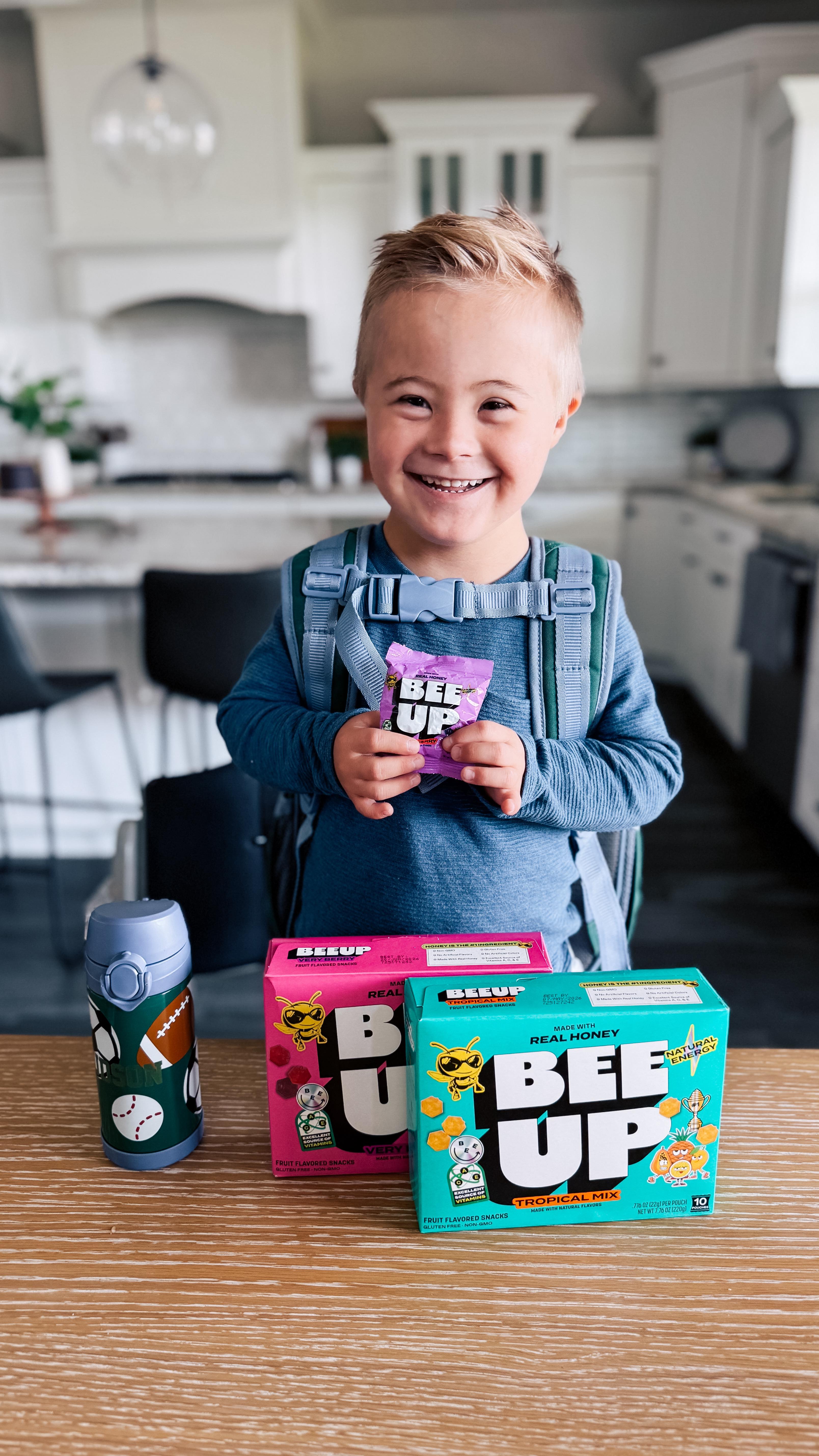 Instagram post by @ourhuddybuddy for BEEUP. Caption reads: Huddy comes home from school every day with the....