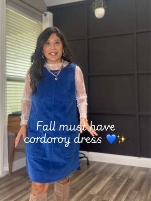 TikTok post by @hey_luzma for OmmigO. Caption reads: The PERFECT blue corduroy dress for fall 💙🍂....