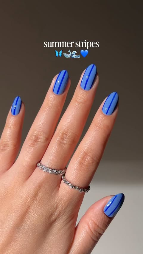 Instagram post by @bycheznails for ella+mila. Caption reads: [...] for summer sun with these stripes 😎☀️....