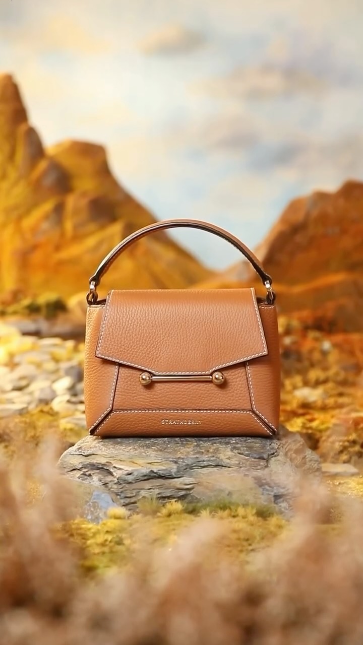 Instagram post by @hannahlemon_art for Strathberry. Caption reads: A miniature ode to Scotland, in celebration of....