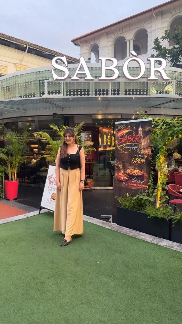 Instagram post by @food.travel.directory for 3 Dogs Media. Caption reads: A taste of Spain in Singapore!🇸🇬 Craving for....