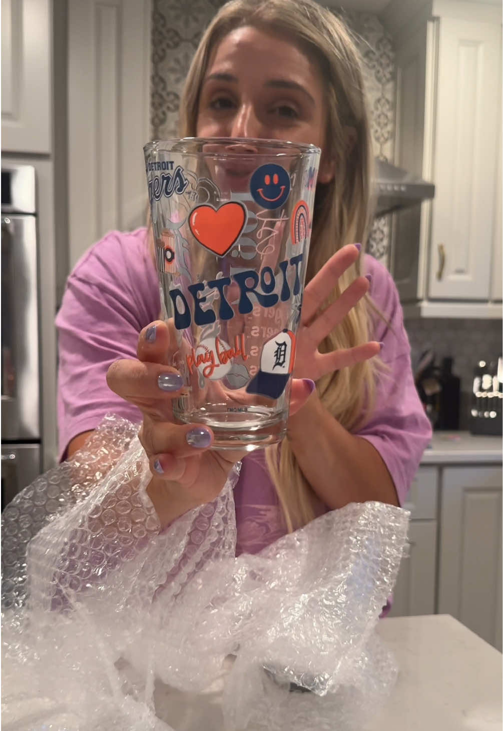 TikTok post by @shopmamaa for QVC. Caption reads: [...] #glasswarecollection #homebar @QVC, Inc....
