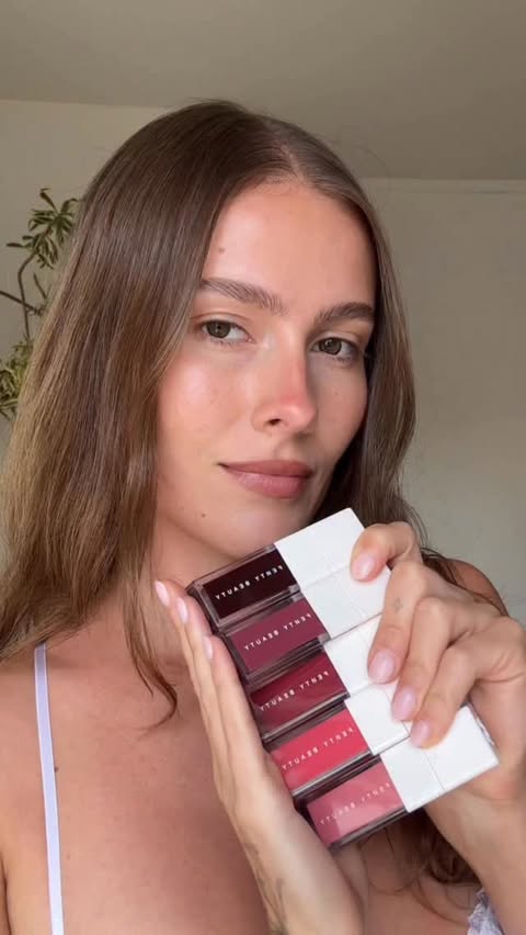Instagram post by @madisonamateau for FENTY BEAUTY BY RIHANNA. Caption reads: Summer cheeks using @fentybeauty new shake ‘n play....