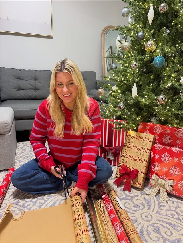 Instagram post by @caitlinonthecoast for Ocean State Job Lot. Caption reads: [...] my gift wrapping supplies from Ocean State....