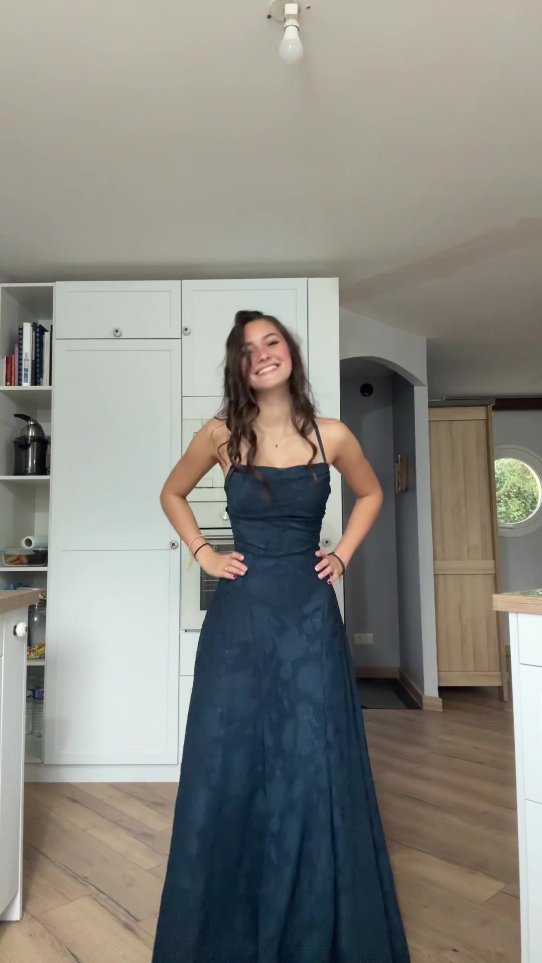 TikTok post by @jadou_2528 for Azazie. Caption reads: ROBE LONGUE MARINE IRELIA@Azazie #pourtoi #fyp....