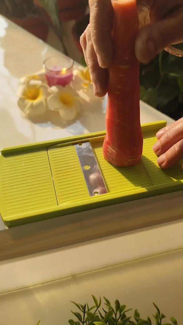 Instagram post by @corner_to_discover for AGARO Lifestyle. Caption reads: 🥕 Carrot Chips

Healthy snacking just got....