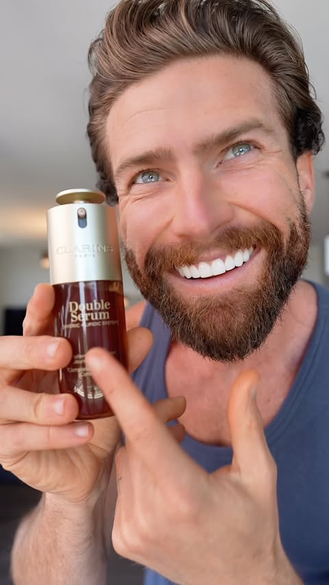 Instagram post by @scottyscheller for Clarins. Caption reads: [...] skin ✨ So this is why I'm glowing✨✨ Clarins....