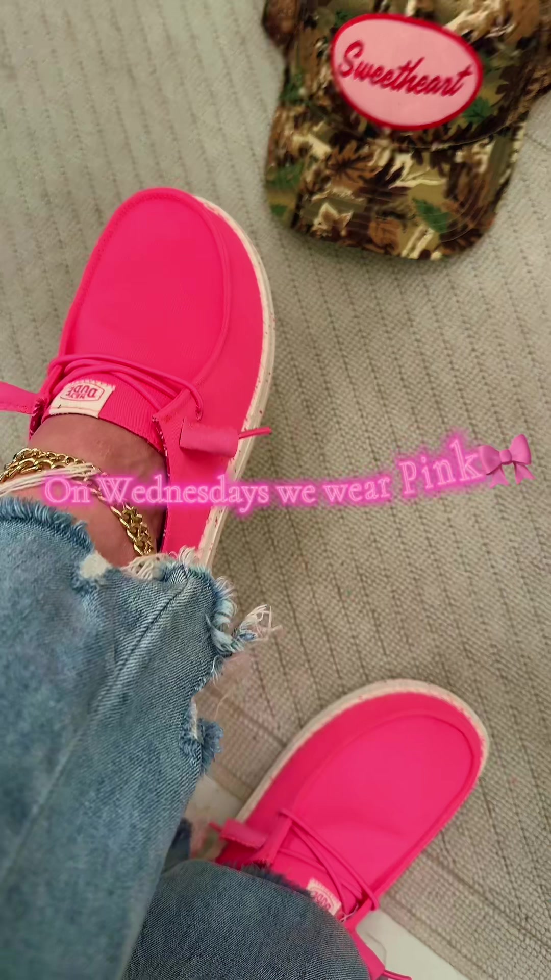 TikTok post by @adrianegweyn for HEYDUDE shoes. Caption reads: [...] hot pink! 💕🫶🏽 @HeyDude #heydude....