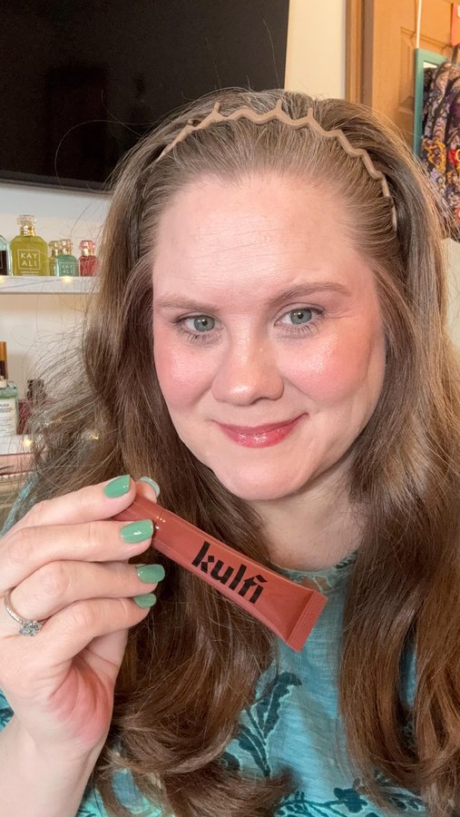 Instagram post by an influencer for Kulfi Beauty. Caption reads: Kulfie ⭐️CODE: AnneW for 10% off 🔗 Lip Snack....