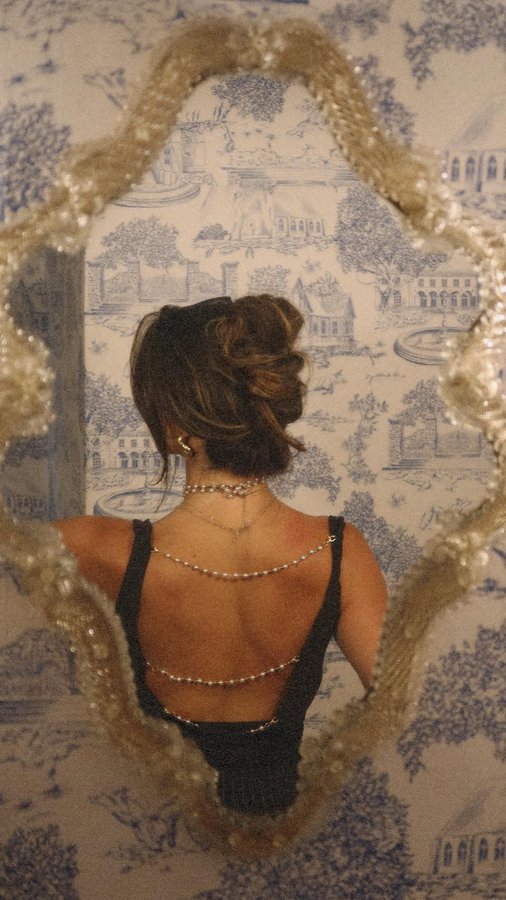 Instagram post by @nicolette_evans for Sasha Therese. Caption reads: Waiting on the weekend like ⏱️ 

#vintageglam....