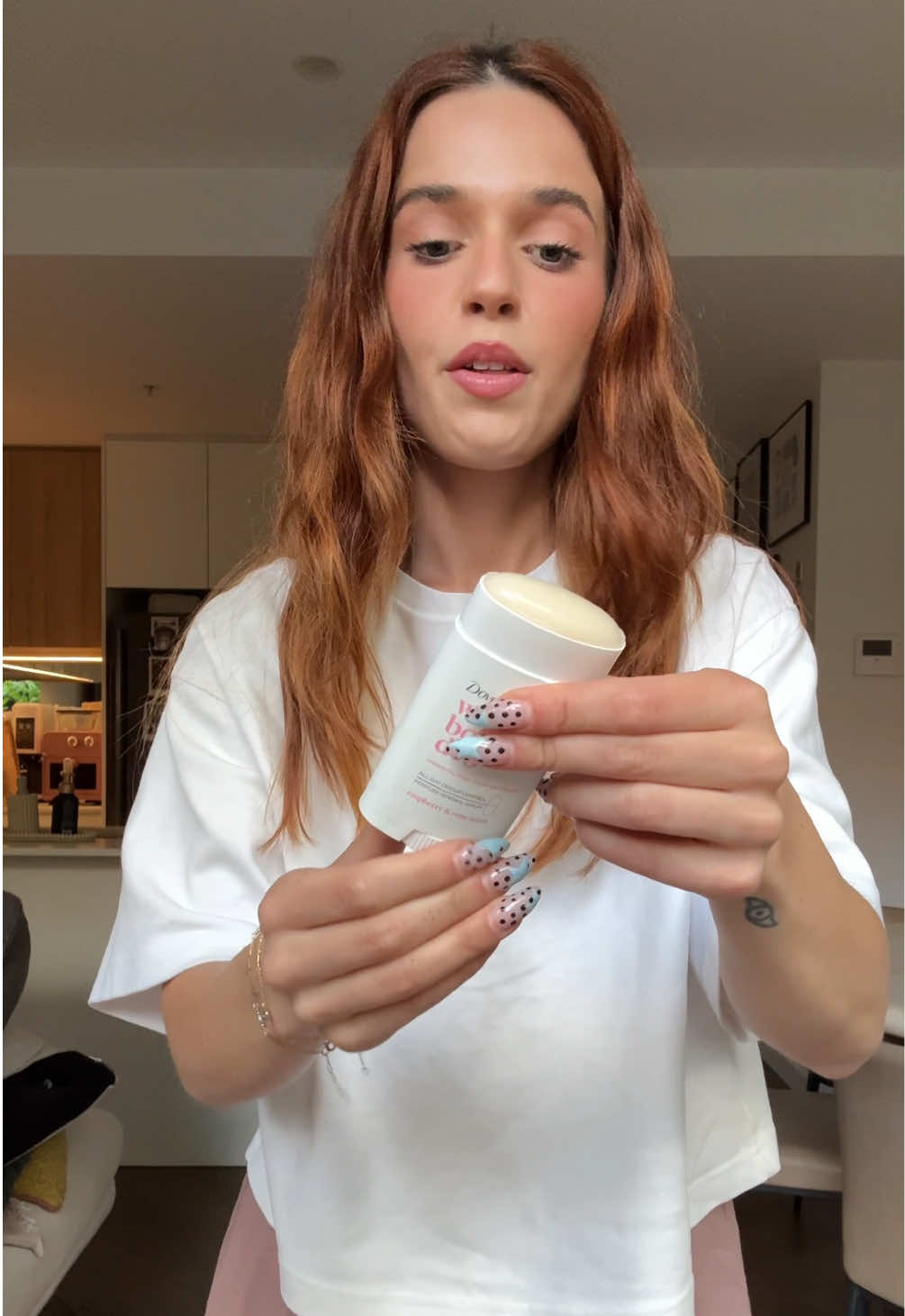 TikTok post by @adellepetros for Dove. Caption reads: Dove works hard so you don't have to. Available at....