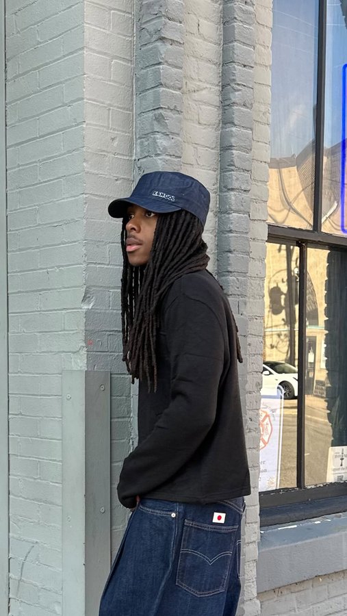 Instagram post by @noteliwho for Kangol South Africa. Caption reads: Sundays Best in @Kangol #Kangol #AD.