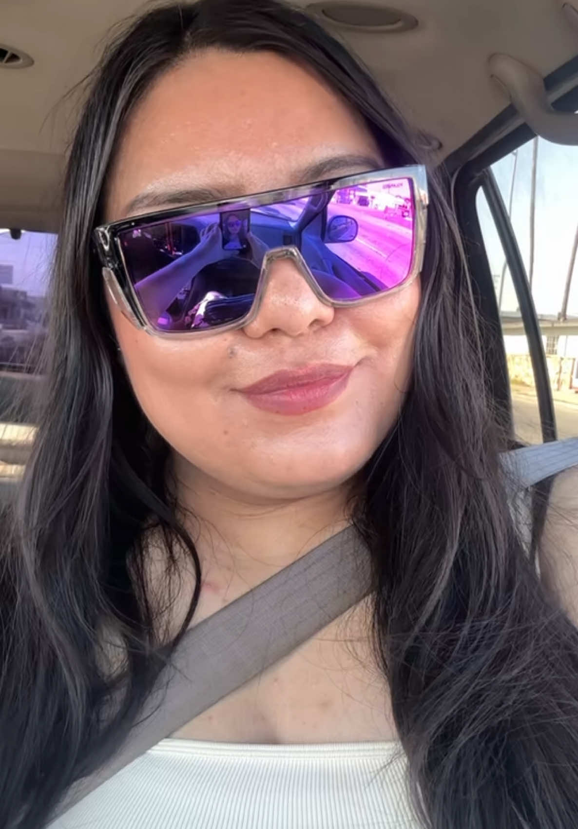 TikTok post by @simplyisabelcee for Bomber Eyewear. Caption reads: [...] it is bright outside☀️😊💕 @Bomber Eyewear....