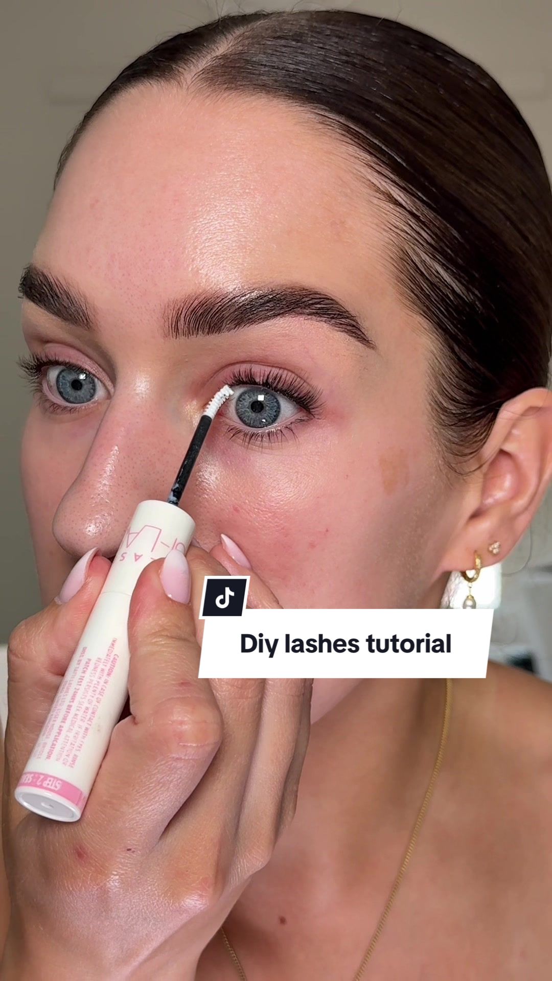 TikTok post by @blendbyhan for TATTI LASHES. Caption reads: start doing you lashes from home today! Level:....