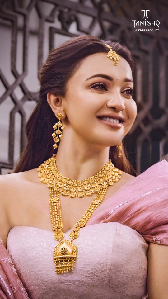 Instagram post by @myself_koushani for Tanishq. Caption reads: I’ve played a bride on screen many times. But for....