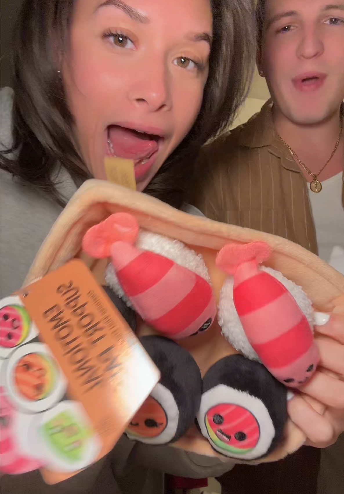 TikTok post by @vitoandniyah for What Do You Meme. Caption reads: We definitely said no gifts... But I love them ❤️....