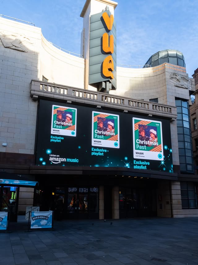 Instagram post by @whamofficial for Amazon Music. Caption reads: [...] on the Christmas Past Playlist on....