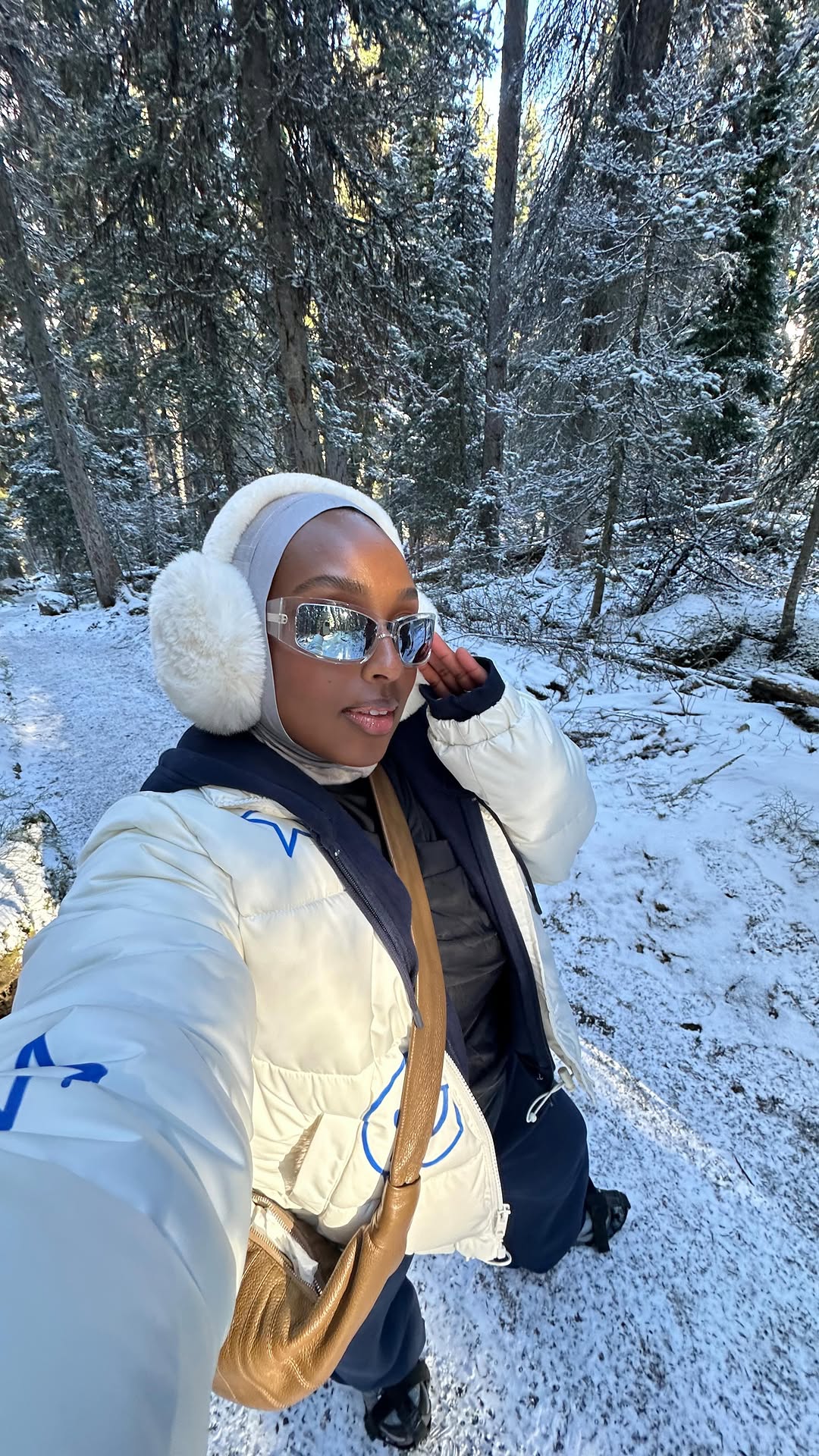 Instagram post by @ayshaharun for NIVEA USA. Caption reads: Cold plunging into ❄️ice cold❄️ glacier water was....