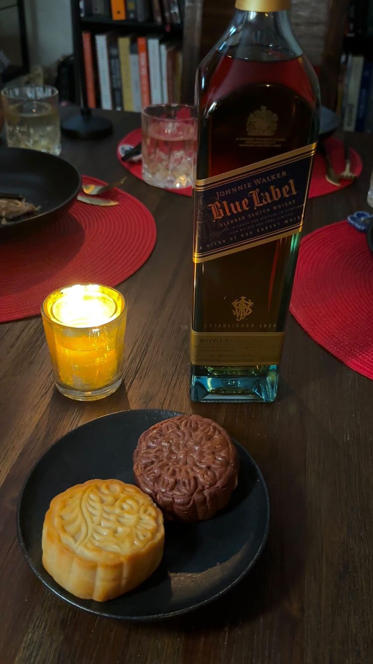 Instagram post by @chefboylee for Johnnie Walker US. Caption reads: #ad Johnnie Walker x Chefboylee Dinner. Happy Mid....