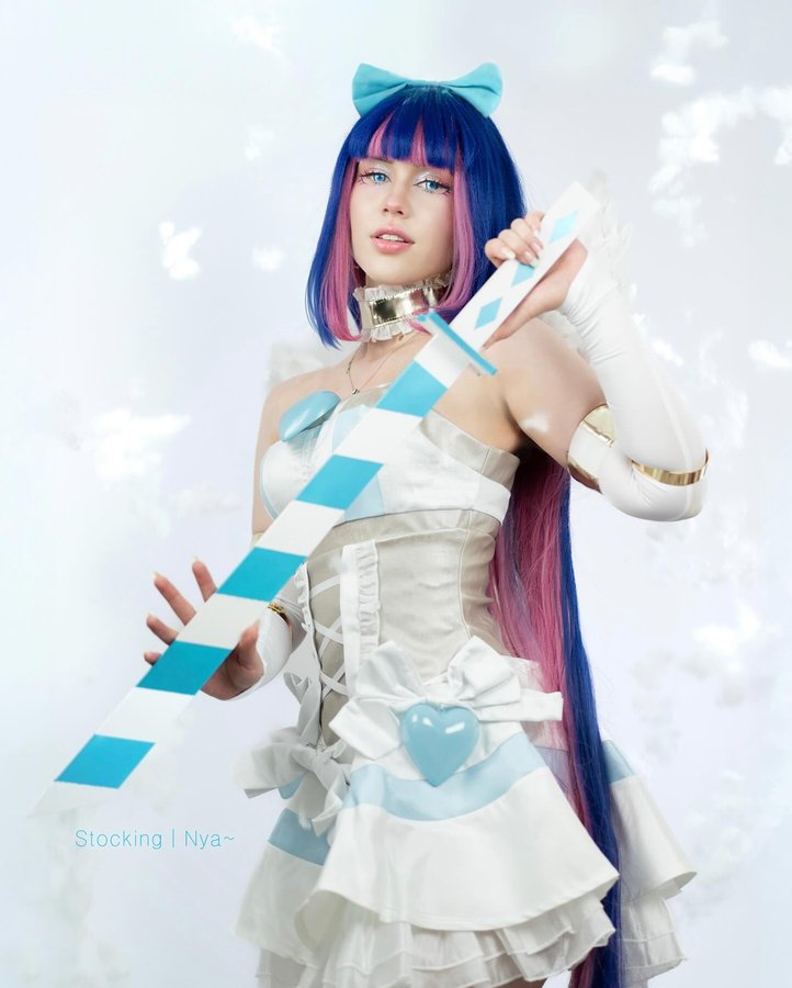 Instagram post by @nya__cosplay for dokidokicosplay. Caption reads: [...] Garterbelt” _______ cosplay from....