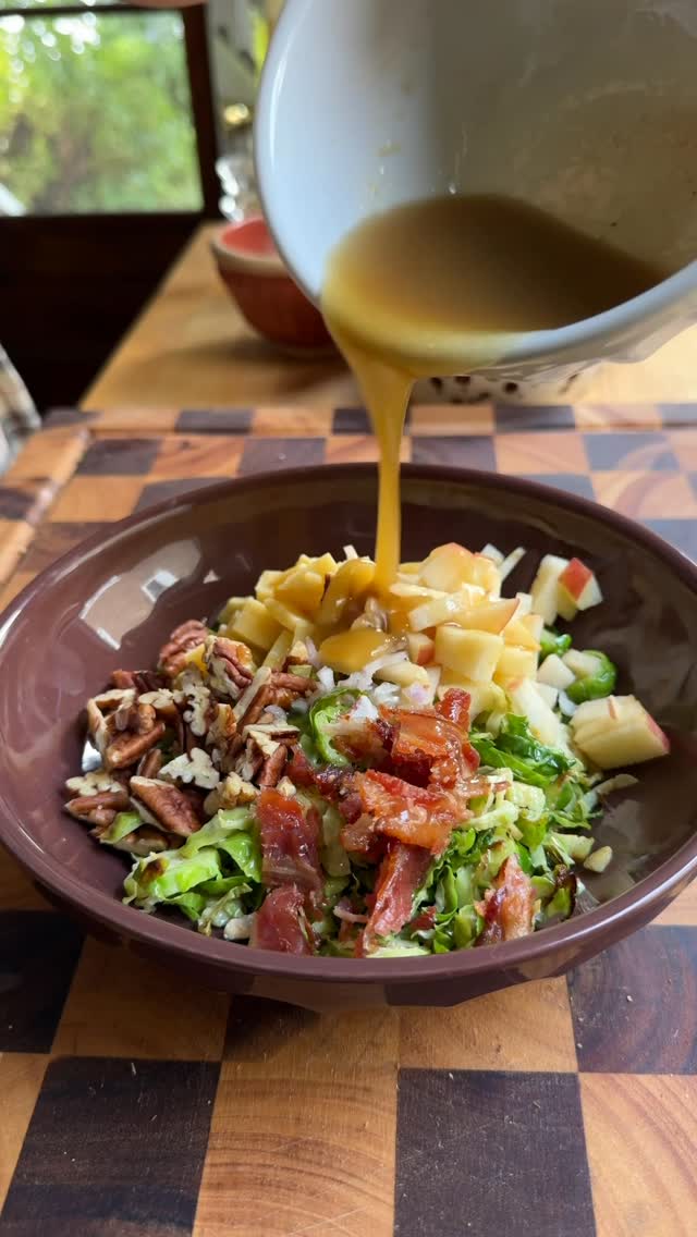 Instagram post by @sokos.kitchen for KerrygoldUSA. Caption reads: BRUSSELS SPROUT SALAD WITH CREAMY MAPLE DRESSING....