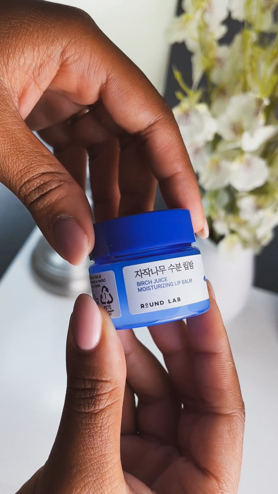 Instagram post by @yoli_xxox for Round Lab. Caption reads: ✨ Meet my new lip obsession ✨ The Birch....