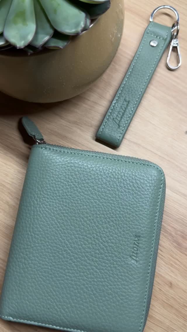 Instagram post by @straight.plans for Filofax. Caption reads: Keep it coordinated 🌿 Meet the Norfolk Pocket Zip....