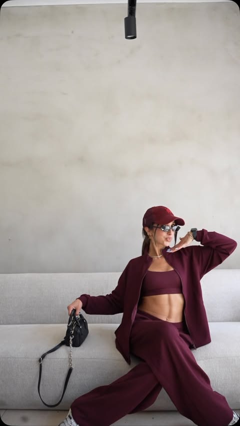 Instagram post by @andreanafrangoudes for Tezenis. Caption reads: [...] do the superior softness tracksuits at....