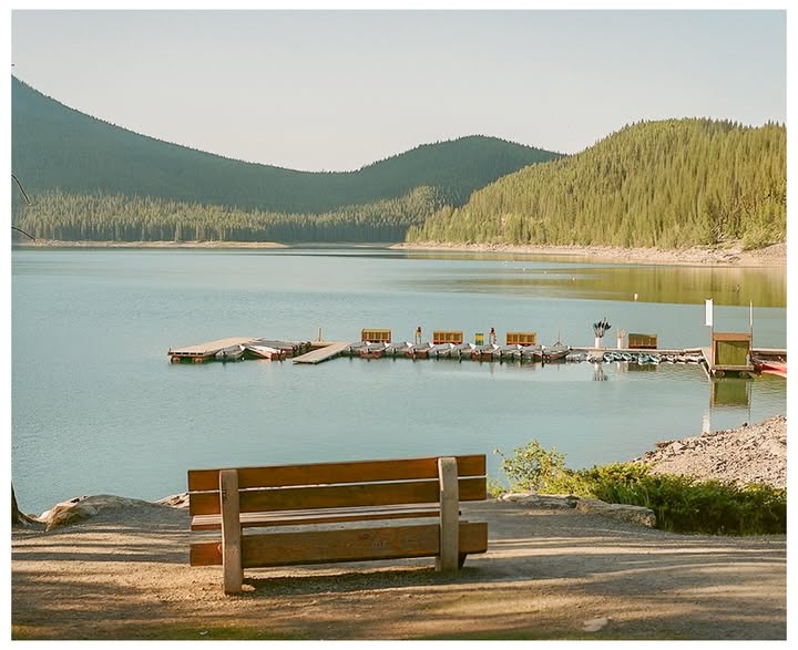 Instagram post by @filmontoast for Kodak. Caption reads: [...] so far Lake Minnewanka, Alberta #mamiya7....