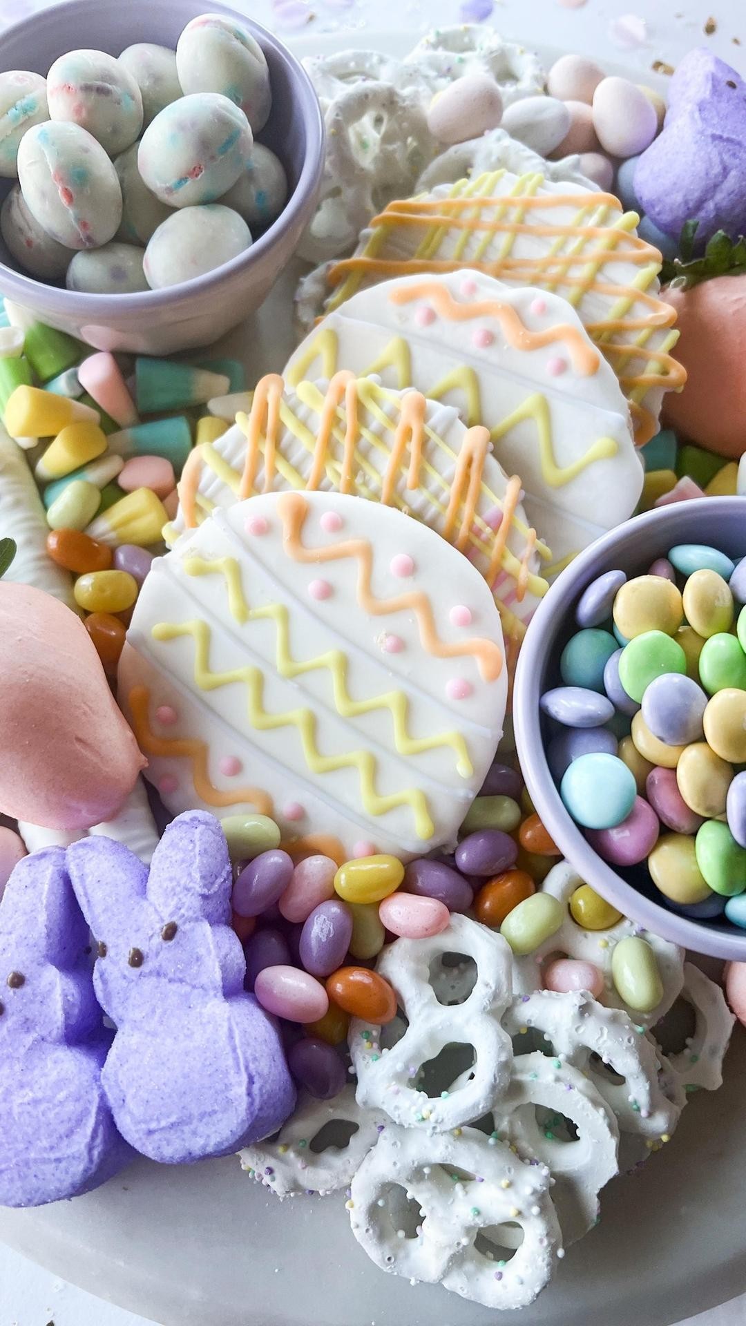Instagram post by @daniellepaschka for Hy-Vee. Caption reads: #ad Let’s make a dessert board for Easter! I found....