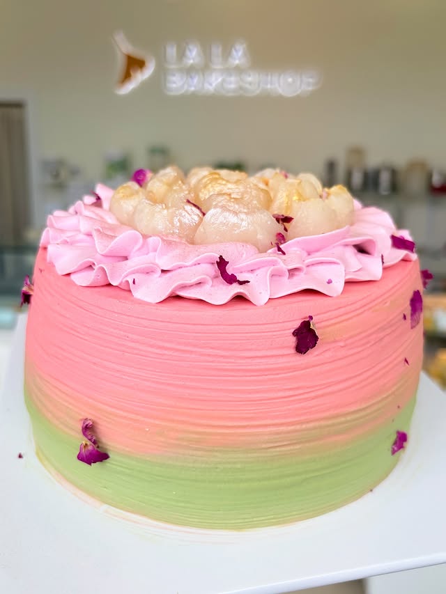 Instagram post by @lalabakeshop.ca for Prestige Worldwide Events - Toronto. Caption reads: Soft, floral, and not too sweet 🌸 📍....
