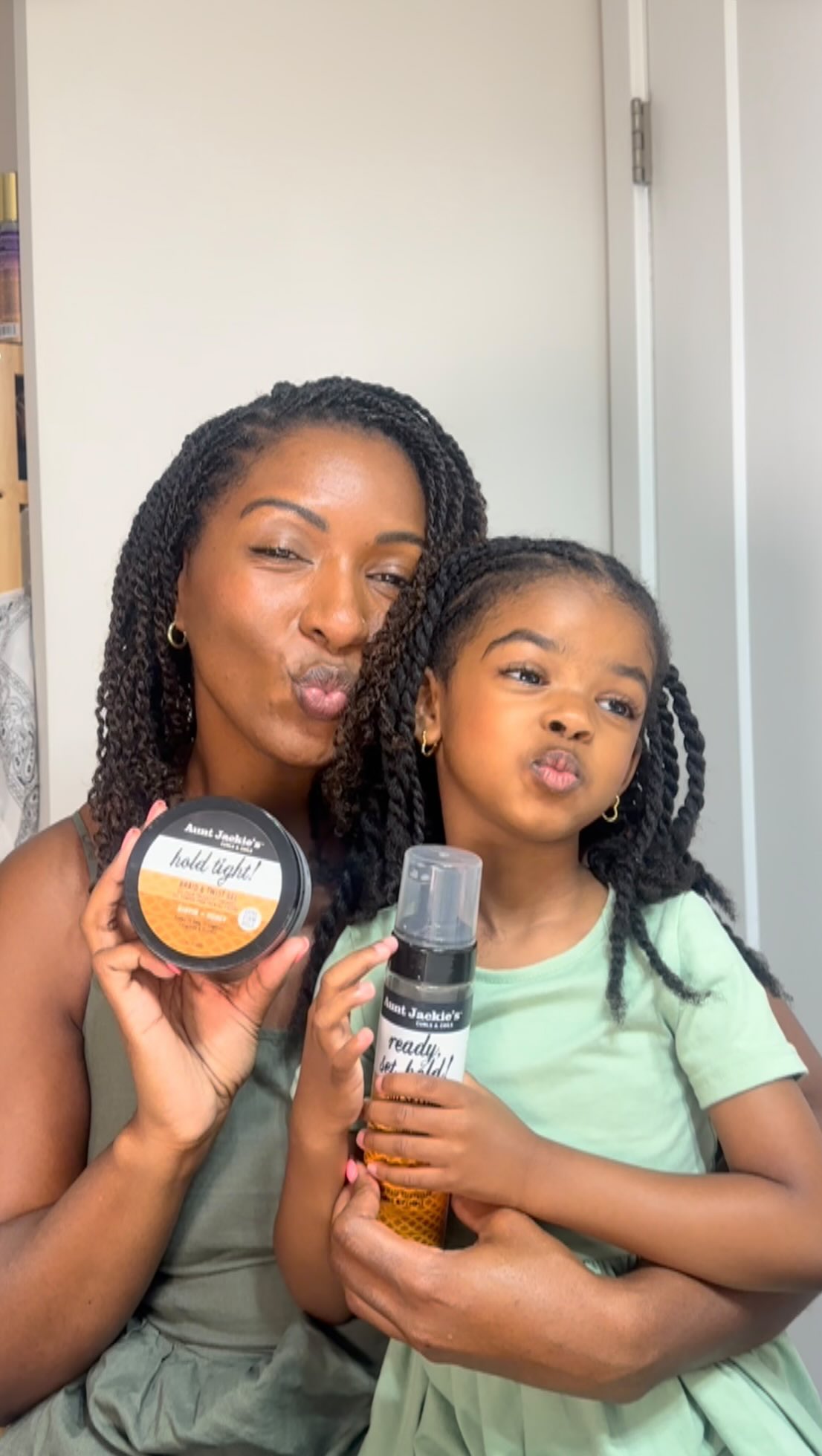 Instagram post by @dippedinshanelle for Aunt Jackie's Curls & Coils. Caption reads: every time I do Kadence’s hair, it reminds me that....