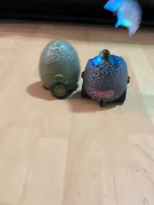 TikTok post by @brittandjd for Vvinca. Caption reads: Battle dinosaur eggs @Vvinca #remotecontroltoy....
