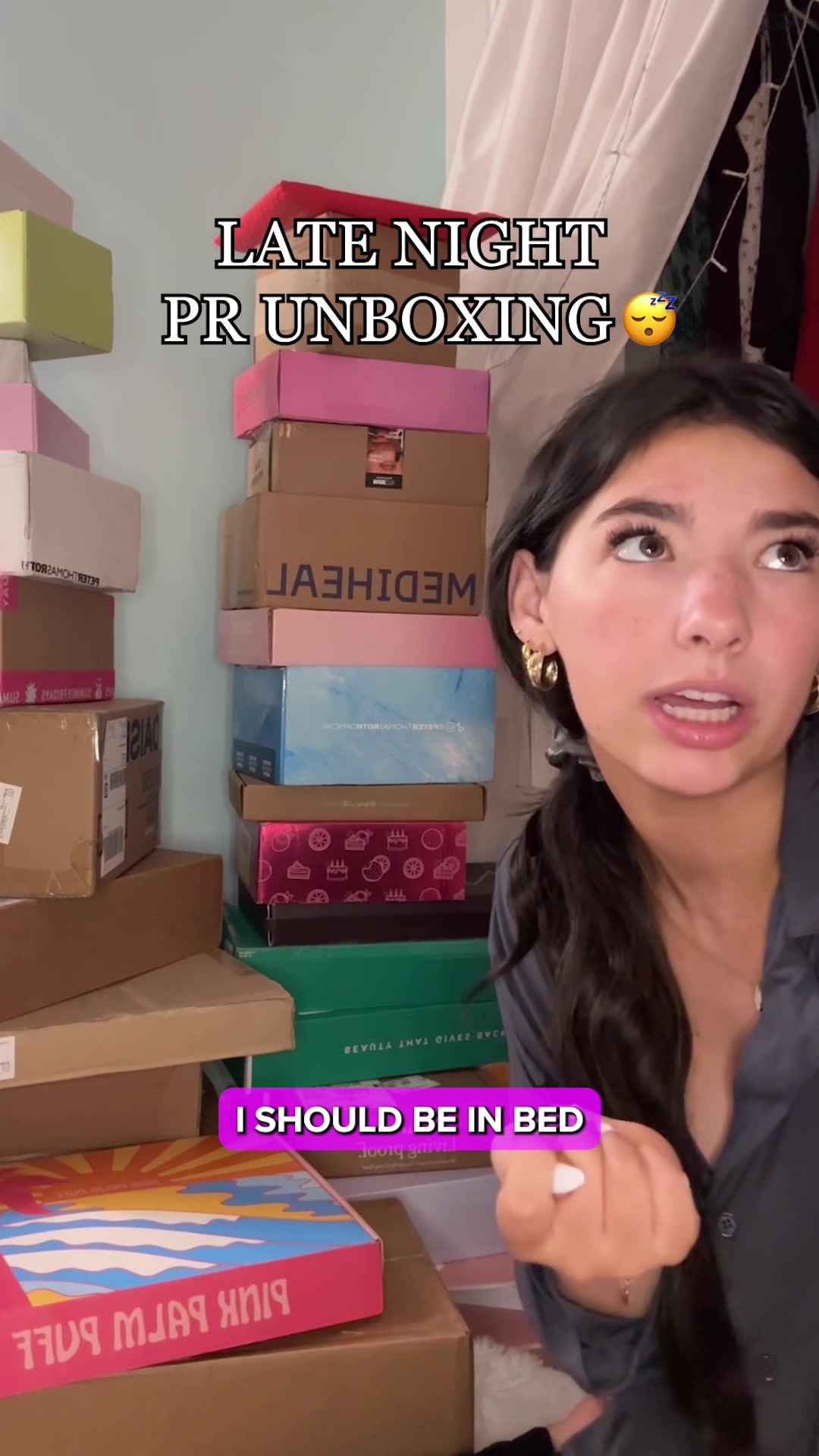 TikTok post by @kayleighbursch for Kosas. Caption reads: PR UNBOXING🙌🙌 @PINK PALM PUFF @Briogeo @Kosas....