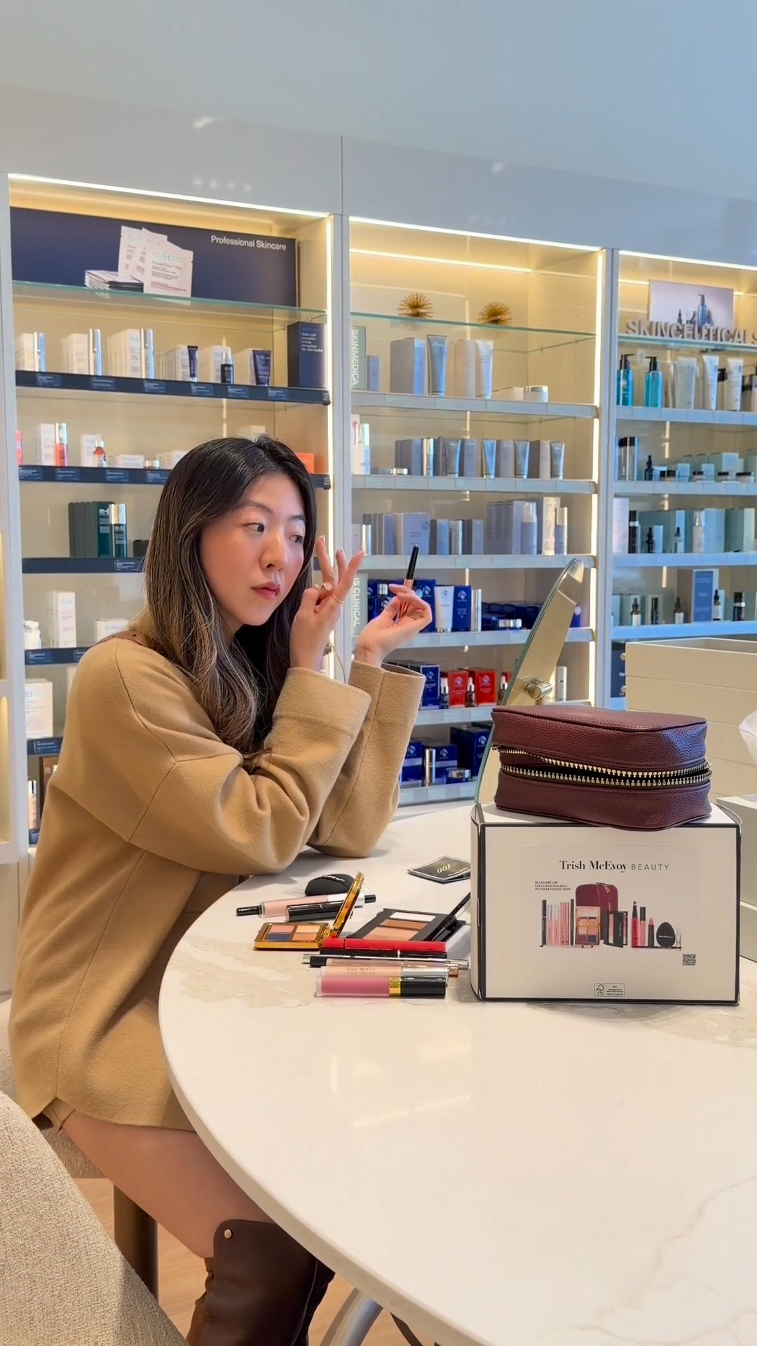 Instagram post by @chanelogy for Bluemercury. Caption reads: Level up your mirror time with @trishmcevoy at....