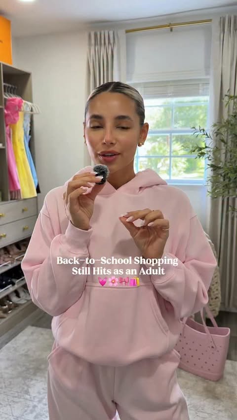 Instagram post by @gabrielaxgomez for Crocs. Caption reads: [...] it pink 🎀📚 apparently a new pair of @crocs....