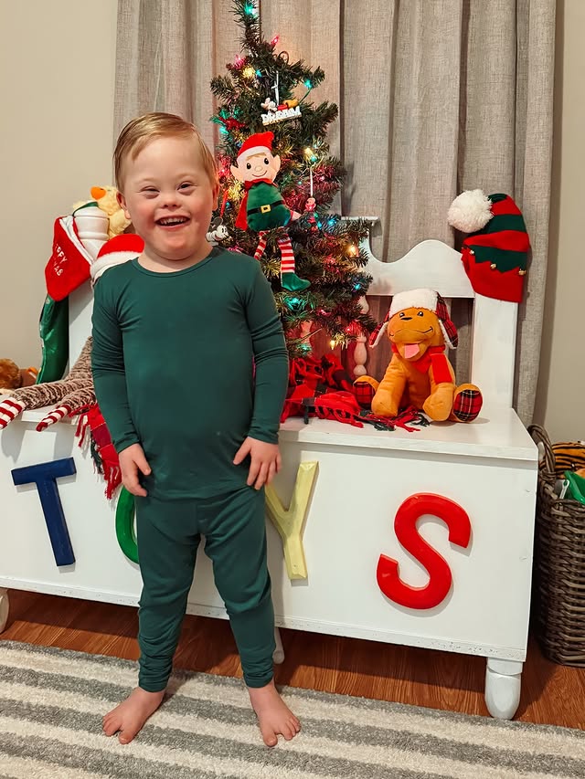 Instagram post by @a_schwien for Kyte Baby. Caption reads: We are in full blown Christmas spirit over here!....