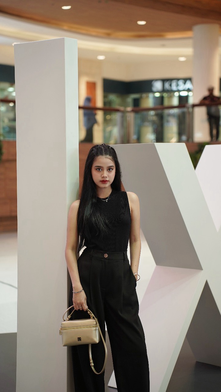 Instagram post by @jejeriyantono_official for Armani Exchange. Caption reads: Feeling amazing wearing A|X Armani exchange for....