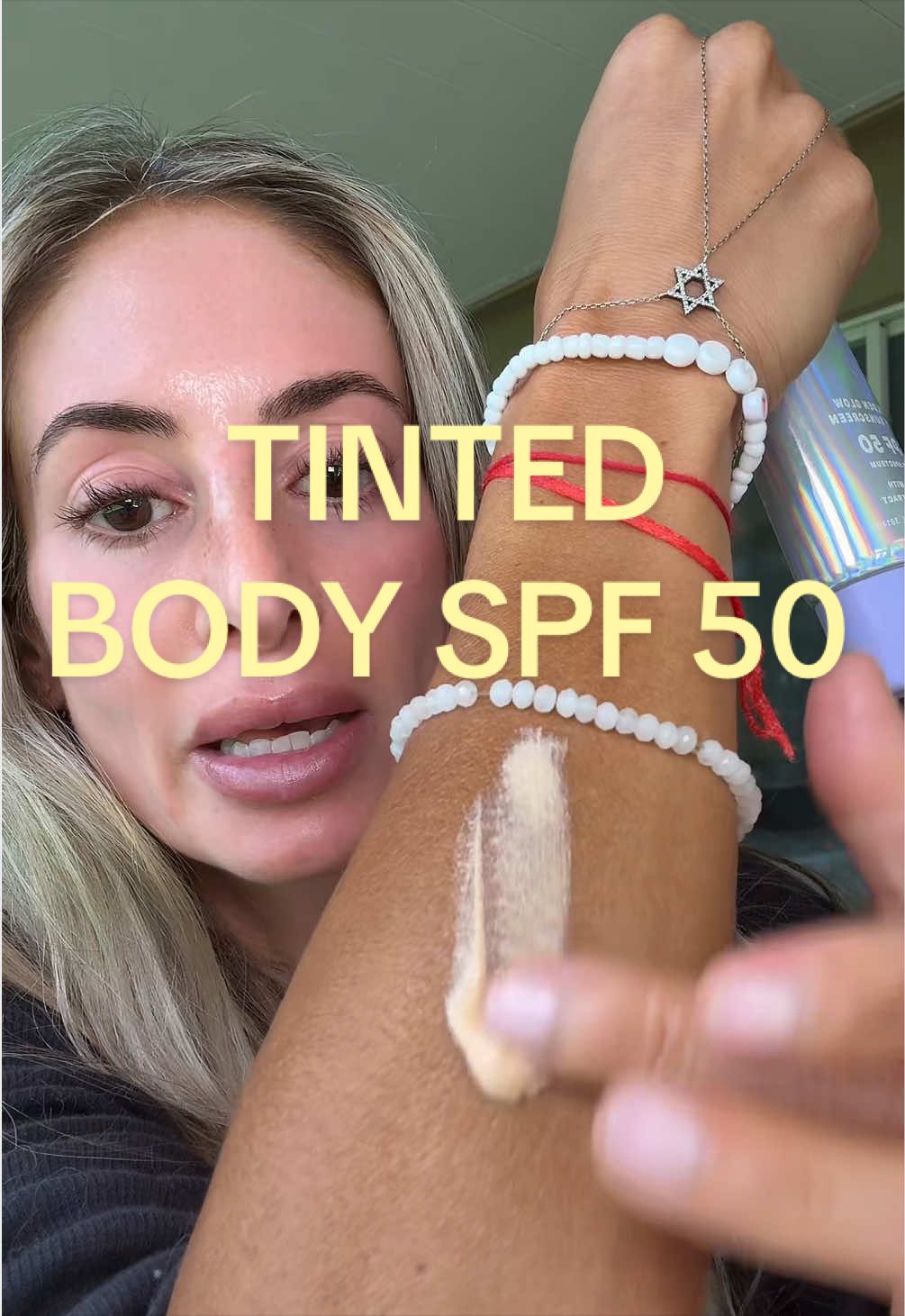 TikTok post by @arriiray for NAKED SUNDAYS. Caption reads: [...] spf but for the body ⛱️ @Naked Sundays....